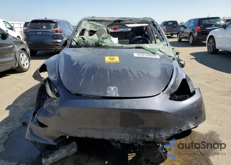 2022 Tesla Model Y from USA, damaged, VIN 7SAYGDEE5NF553720